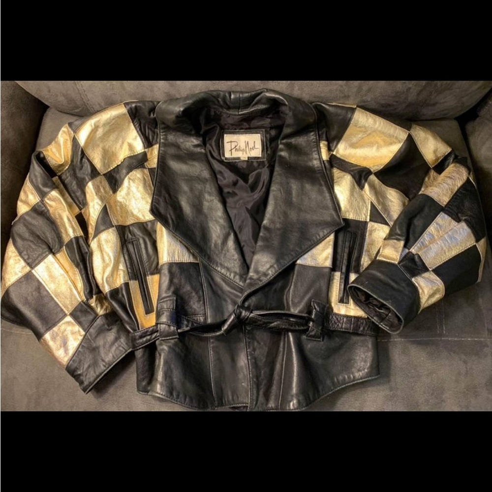 Vintage Philip Noel size small black and gold leather jacket with tie.